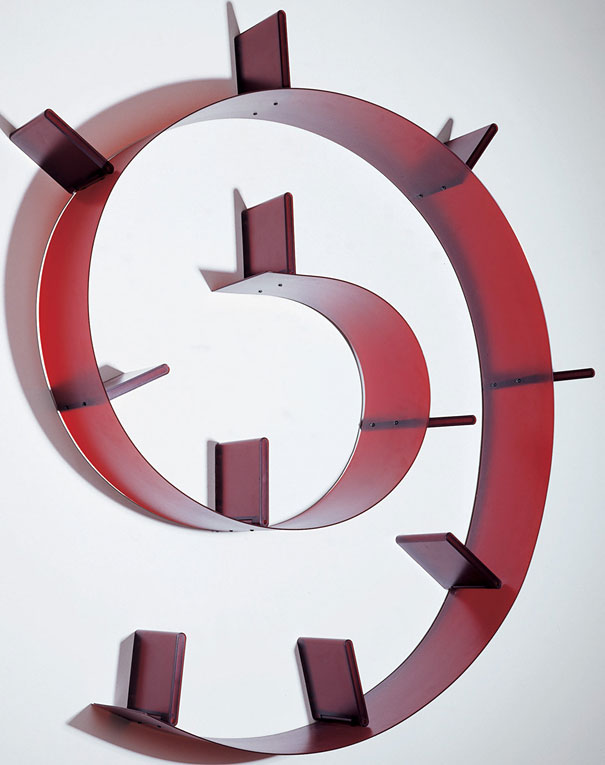 Creative bookshelf design featuring a spiral shape with red shelves.