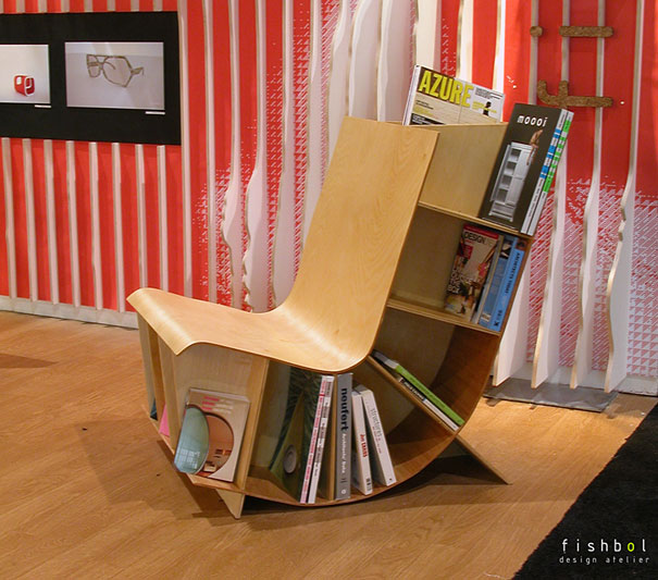 Creative bookshelf design resembling a wooden chair with books neatly arranged along its curves.