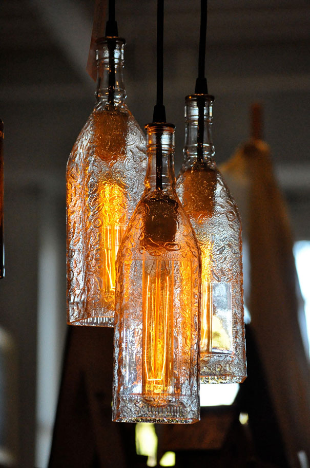 Lighted pendant lamps made from old bottles with patterns Lighted pendant lamps made from old bottles with patterns