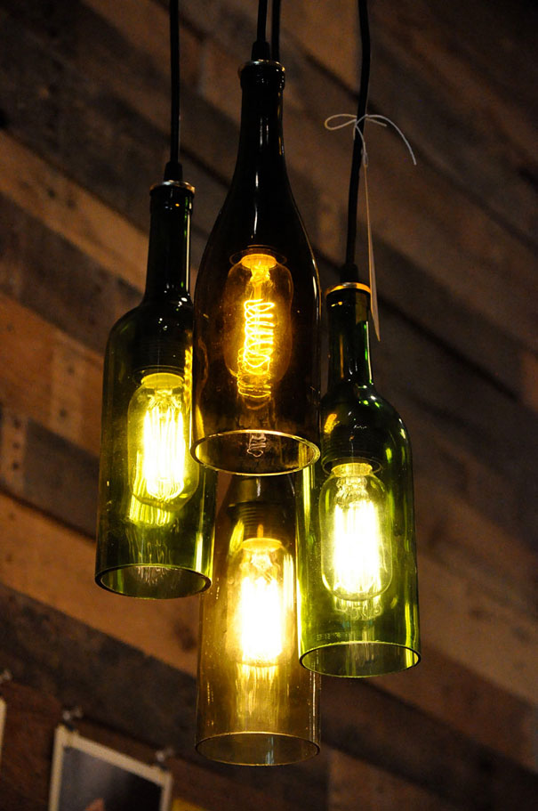Lighted pendant lamps made from old bottles