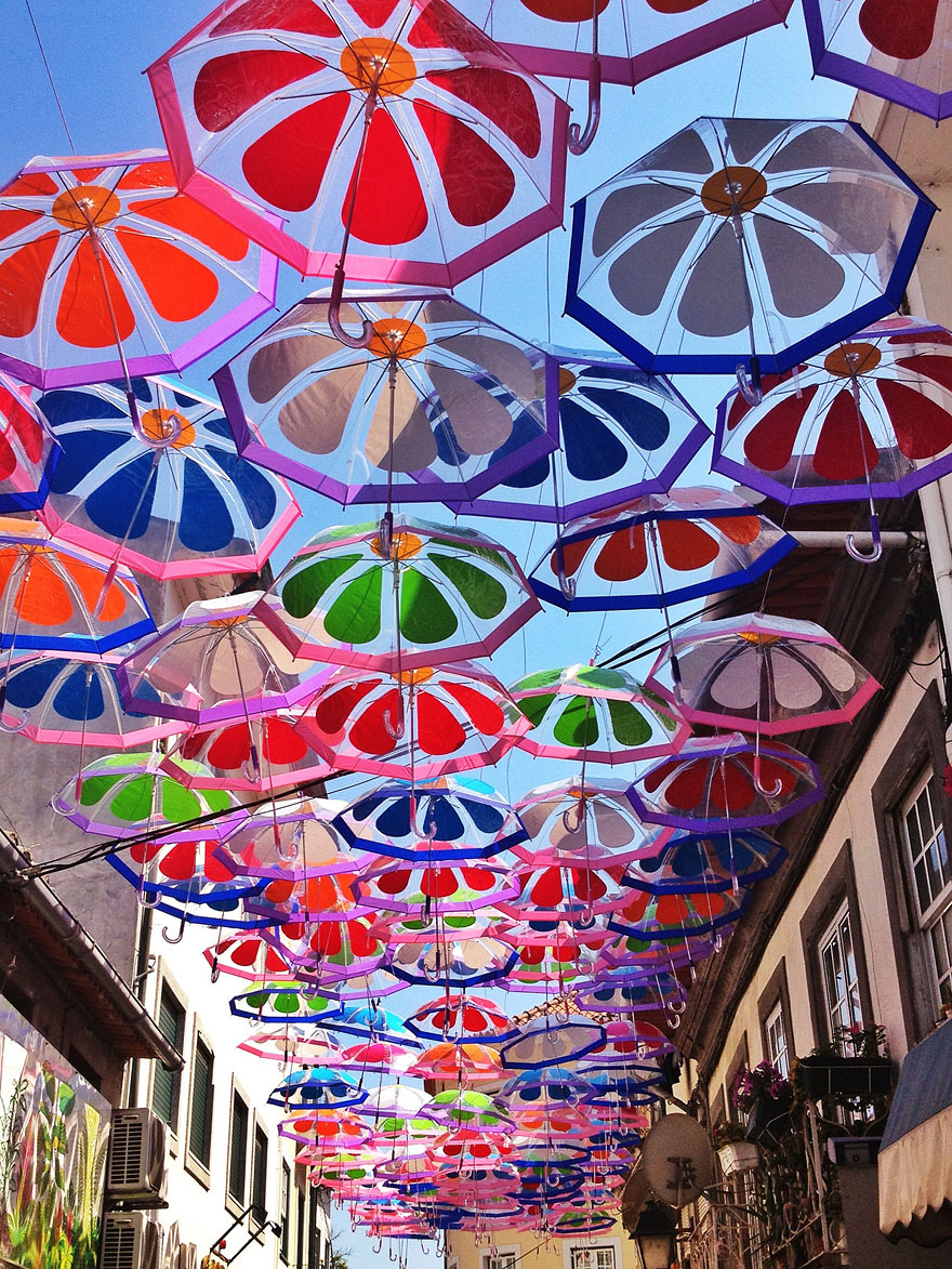 Hundreds of Floating Umbrellas Once Again Cover The Streets in Portugal Hundreds of Floating Umbrellas Once Again Cover The Streets in Portugal