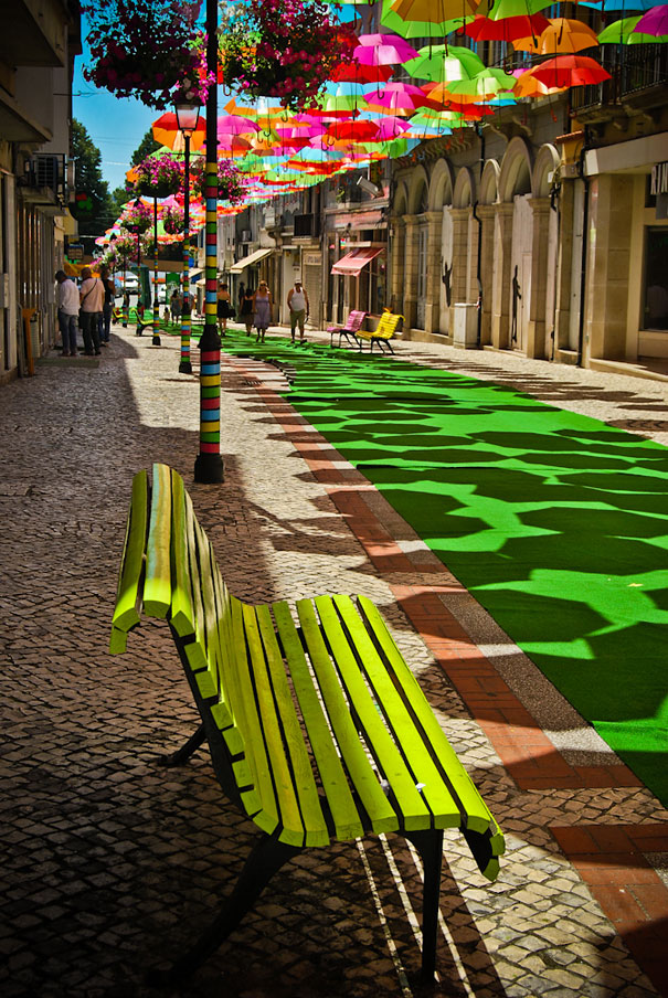 Hundreds of Floating Umbrellas Above a Street in Agueda, Portugal Hundreds of Floating Umbrellas Above a Street in Agueda, Portugal