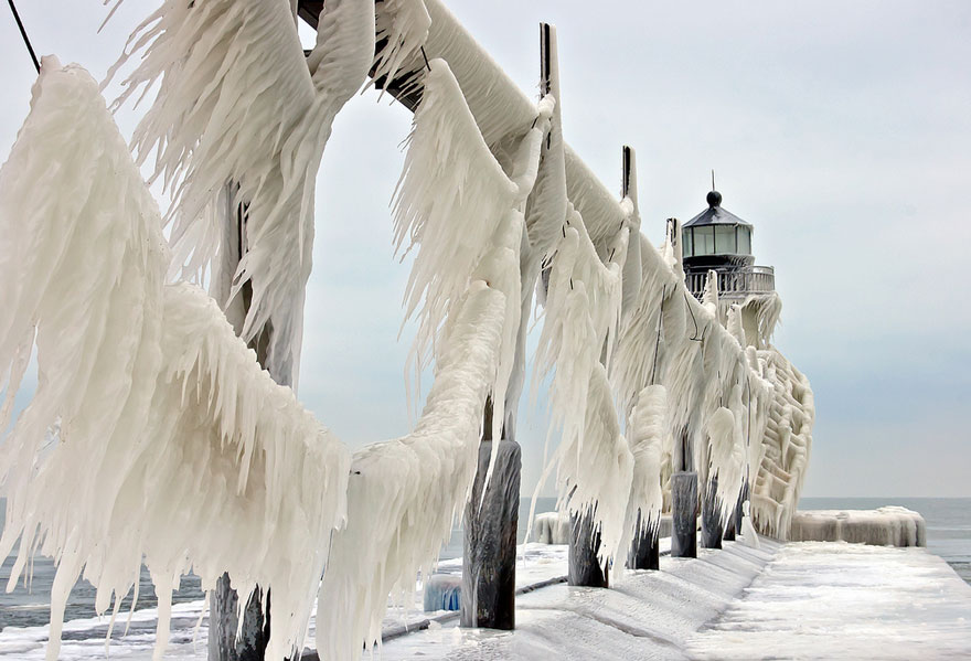 Frozen Lighthouses Caught In Winter's Icy Grip On Lake Michigan Shore Frozen Lighthouses Caught In Winter's Icy Grip On Lake Michigan Shore