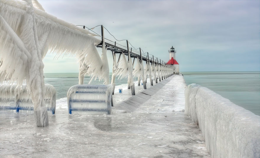 Frozen Lighthouses Caught In Winter's Icy Grip On Lake Michigan Shore Frozen Lighthouses Caught In Winter's Icy Grip On Lake Michigan Shore