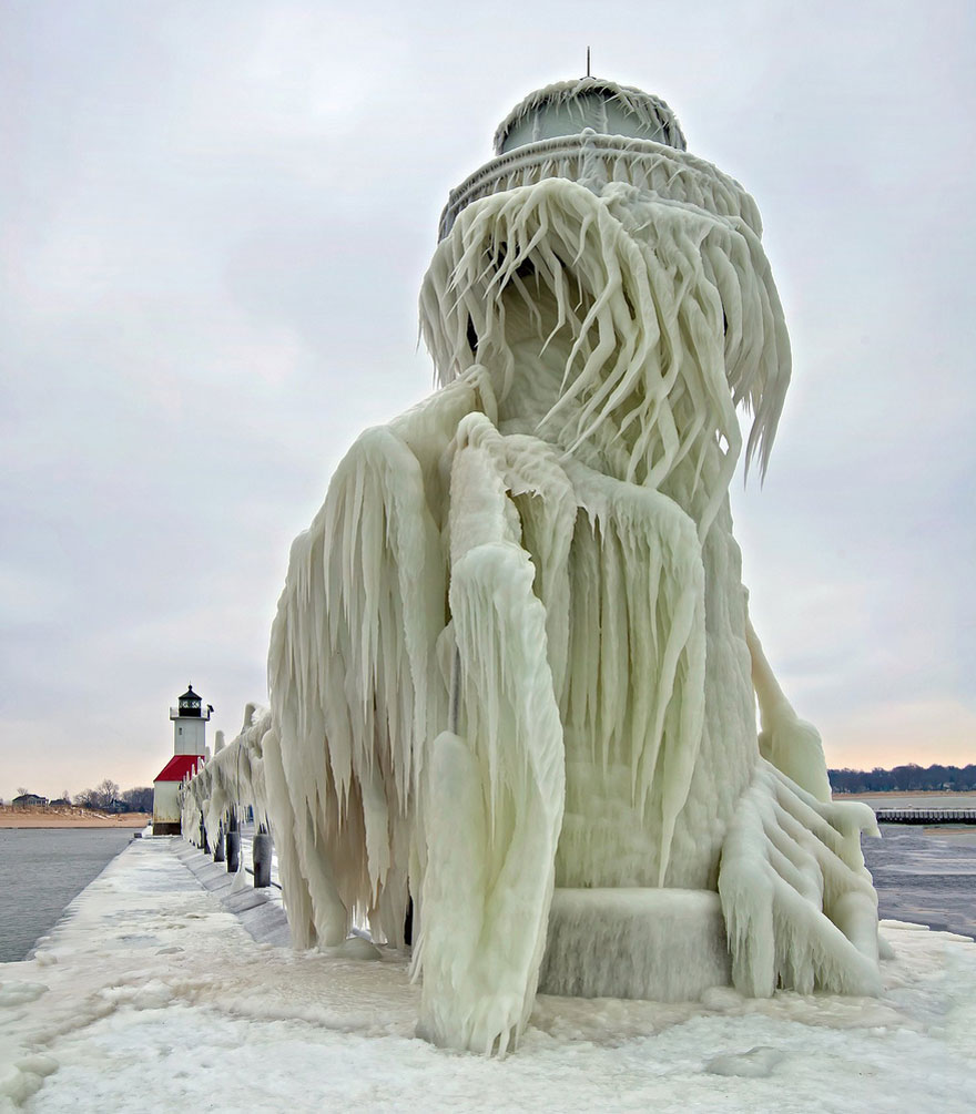Frozen Lighthouses Caught In Winter's Icy Grip On Lake Michigan Shore Frozen Lighthouses Caught In Winter's Icy Grip On Lake Michigan Shore