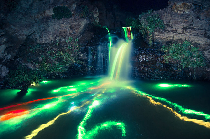 What Happens When You Throw Some Glow Sticks into a Waterfall What Happens When You Throw Some Glow Sticks into a Waterfall