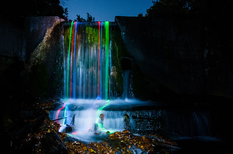 What Happens When You Throw Some Glow Sticks into a Waterfall What Happens When You Throw Some Glow Sticks into a Waterfall
