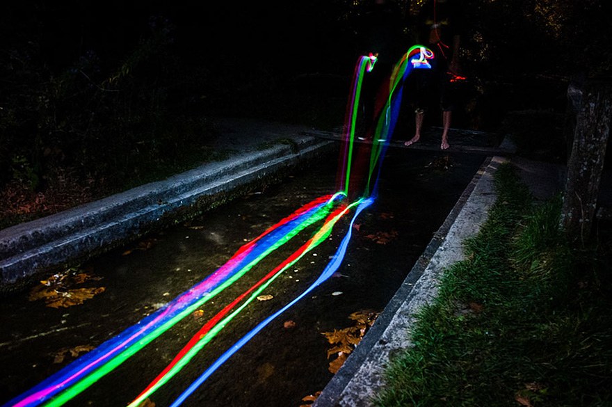 What Happens When You Throw Some Glow Sticks into a Waterfall