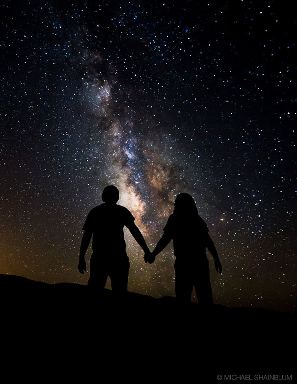 Silhouettes of a couple holding hands under a starry sky, capturing one of the happiest moments ever. Silhouettes of a couple holding hands under a starry sky, capturing one of the happiest moments ever.