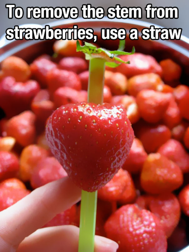 Plastic straw in the middle of a strawberry 