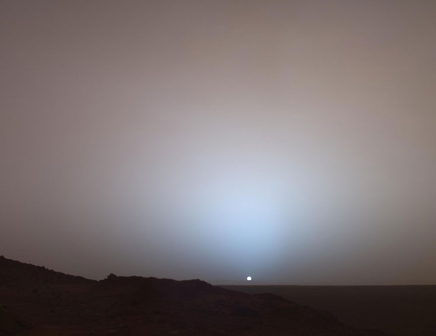 Sunset on Mars with a hazy sky, capturing a powerful image of extraterrestrial landscape. Sunset on Mars with a hazy sky, capturing a powerful image of extraterrestrial landscape.