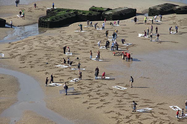 9,000 Fallen Soldier Sand Drawings Commemorate Those Who Died On D-Day Beach 