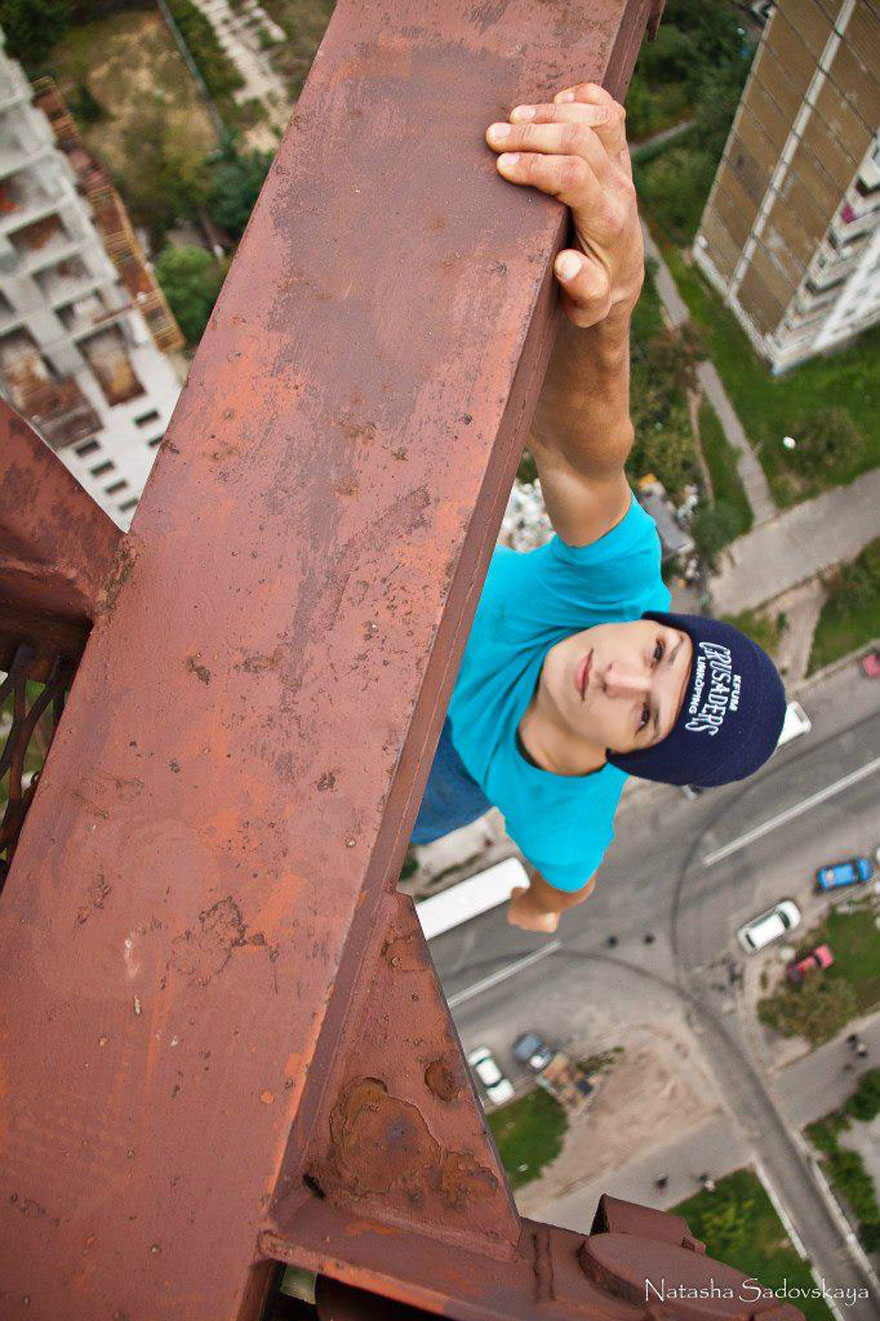 Dizzying Photos of Ukrainian Daredevil Hanging from Tall Buildings