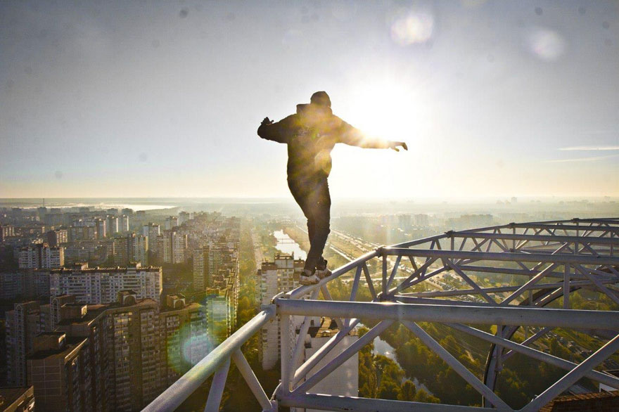 Dizzying Photos of Ukrainian Daredevil Hanging from Tall Buildings